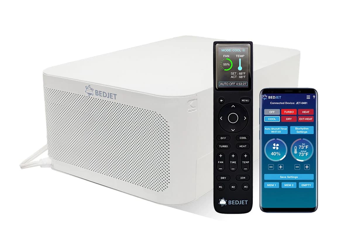 BedJet 3 unit beside its remote and a phone displaying the companion app